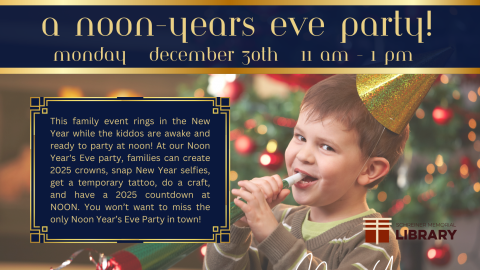 Little boy blowing a new years eve horn with party hat